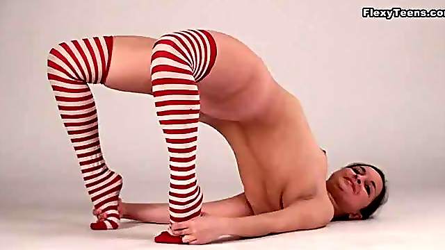 Stunningly flexible girl in sexy striped socks